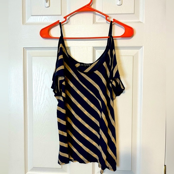 Navy and gold hang off shoulder shirt. - Picture 1 of 4